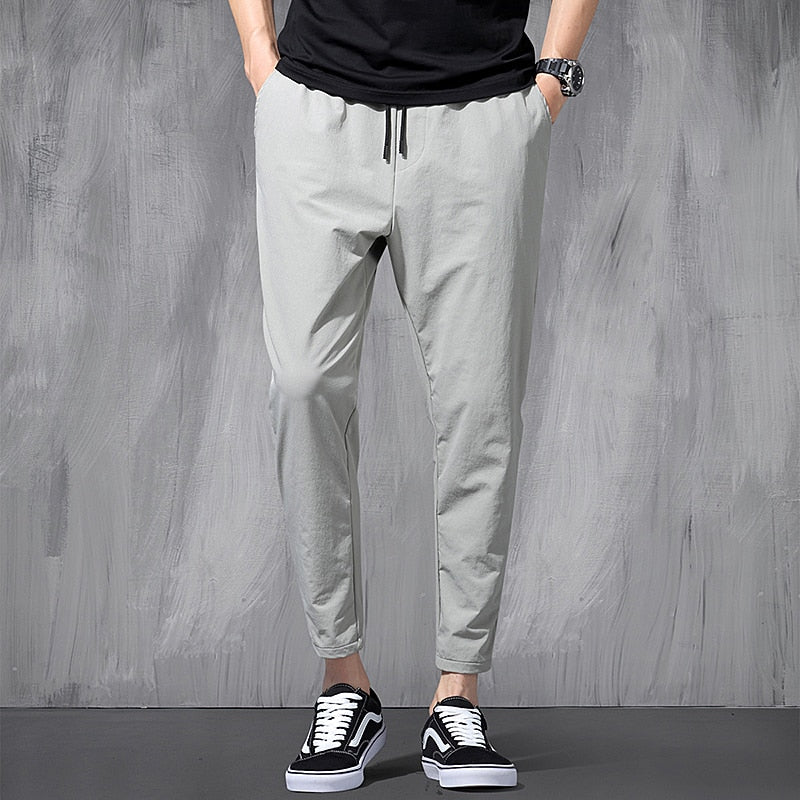 New Korean Ice Silk Elastic Trousers Four Seasons Thin Casual Men'S Loose 9-Point Large Size Small Foot Sports Pants Spring