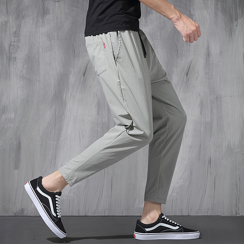 New Korean Ice Silk Elastic Trousers Four Seasons Thin Casual Men'S Loose 9-Point Large Size Small Foot Sports Pants Spring