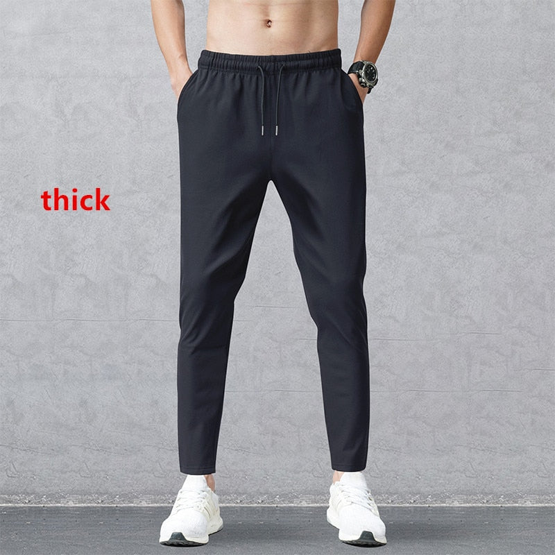 New Korean Ice Silk Elastic Trousers Four Seasons Thin Casual Men'S Loose 9-Point Large Size Small Foot Sports Pants Spring